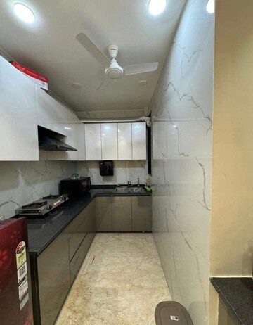 Kitchen in 2 BHK Apartment at Freedom Fighters Enclave – for Rent