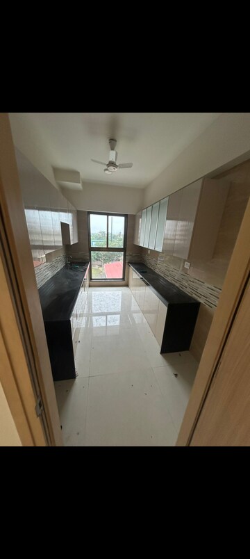 Kitchen in 2 BHK Apartment at Rajesh Raj Infinia, Malad West – for Rent