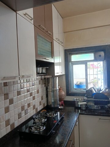 Kitchen in 2 BHK Apartment at Lake Town – for Sale