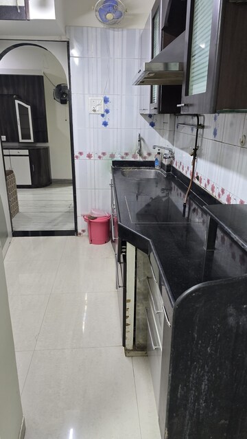Kitchen in 1.5 BHK Apartment at High Rise Building, Goregaon West – for Rent