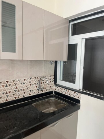 Kitchen in 2 BHK Apartment at Dhamji Shamji Mahavir Spring Tulip Phase 1, Pokhran Road No Two – for Rent
