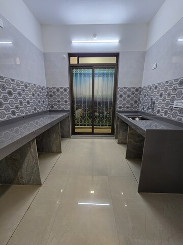 Kitchen in 2 BHK Apartment at Nirvana Gardens, Khadakpada – for Sale