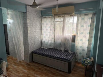 Living Room in 1 BHK Apartment at Andheri West – for Sale