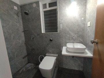 Bathroom in 1 BHK Apartment at Triveni Pearl, Khadakpada – for Sale