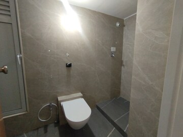 Bathroom in 2 BHK Apartment at Triveni Pearl, Khadakpada – for Sale