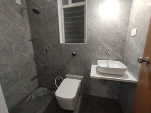 Bathroom in 2 BHK Apartment at Triveni Pearl, Khadakpada – for Sale