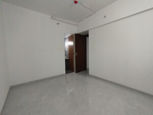 Room in 2 BHK Apartment at Triveni Pearl, Khadakpada – for Sale