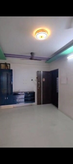 Living Room in 1 BHK Apartment at Ramdev Park, Mira Road – for Sale