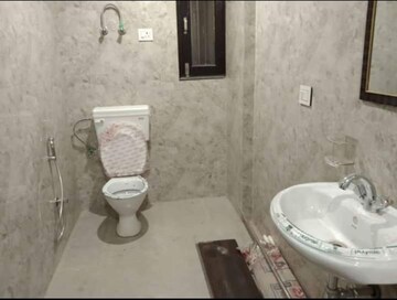 Bathroom in 2 BHK Builder Floor at Chattarpur – for Rent