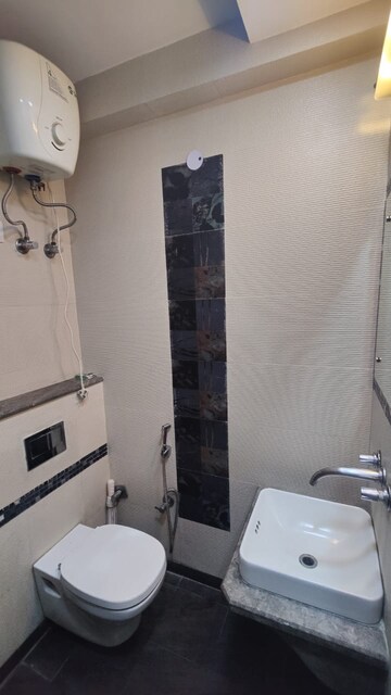 Bathroom in 3 BHK Apartment at Rohini Sector 13 – for Rent