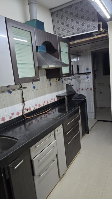 Kitchen in 1.5 BHK Apartment at High Rise Building, Goregaon West – for Rent