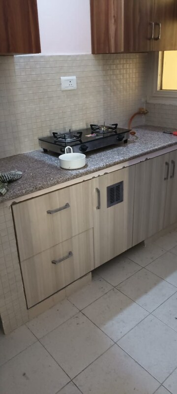 Kitchen in 2 BHK Apartment at AWHO 8B, Vrindavan Yojna – for Rent