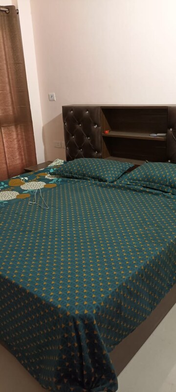 Bedroom in 2 BHK Apartment at AWHO 8B, Vrindavan Yojna – for Rent