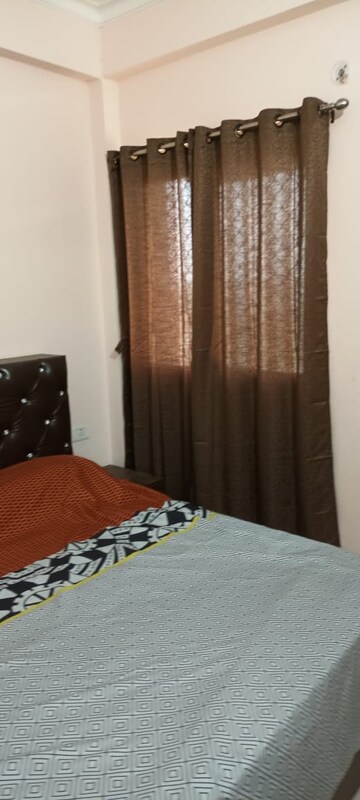 Bedroom in 2 BHK Apartment at AWHO 8B, Vrindavan Yojna – for Rent