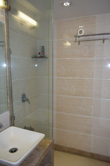 Bathroom in 4 BHK Apartment at Urvashi Terraces, Khar West – for Sale