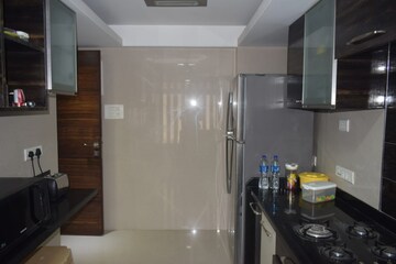 Kitchen in 4 BHK Apartment at Urvashi Terraces, Khar West – for Sale