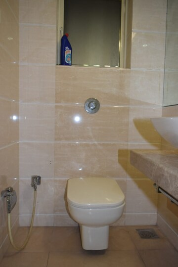 Bathroom in 4 BHK Apartment at Urvashi Terraces, Khar West – for Sale