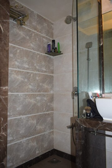 Bathroom in 4 BHK Apartment at Urvashi Terraces, Khar West – for Sale