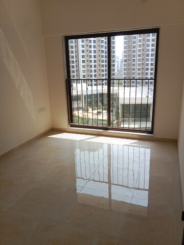 Room in 2 BHK Apartment at Sunteck West World, Tivri – for Rent
