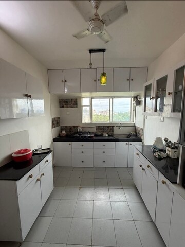 Kitchen in 1 BHK Apartment at Bramha Aangan, Salunkhe Vihar Society – for Sale