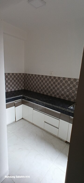 Kitchen in 2 BHK Apartment at SCC Blossom, Raj Nagar Extension – for Sale