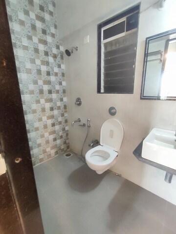 Bathroom in 1 BHK Apartment at Vihang Valley Phase 3, Kasarvadavali – for Rent