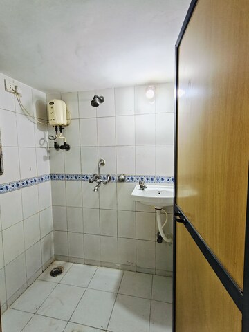 Bathroom in 1 BHK Apartment at Tilak Nagar Building, Tilak Nagar – for Rent