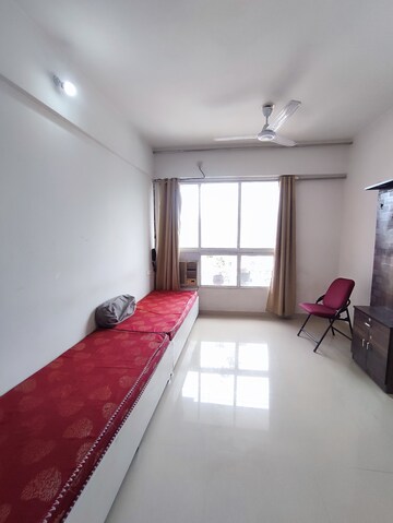 Living Room in 1 BHK Apartment at Puranik Hometown, Ghodbunder Road – for Rent