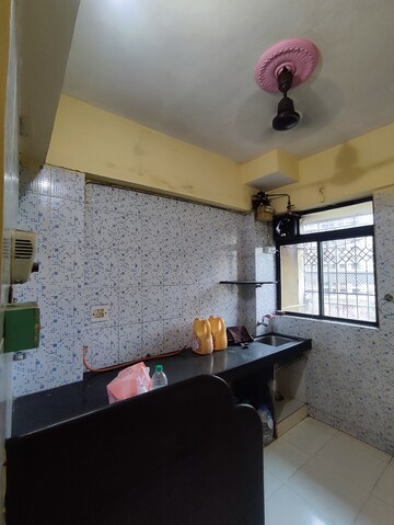 Kitchen in 1 BHK Apartment at Krishna Greenland Park Vastu Federation, Ghodbunder Road – for Rent