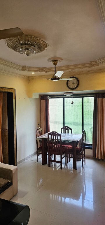 Living Room in 2 BHK Apartment at Green Acres Apartment, Waghbil – for Rent