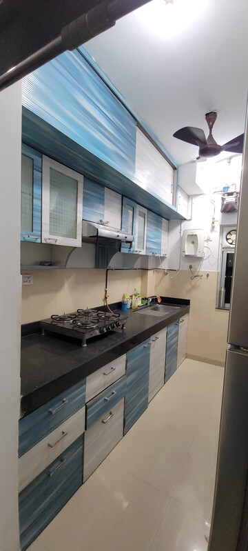 Kitchen in 2 BHK Apartment at Kalpataru Hills, Manpada – for Rent