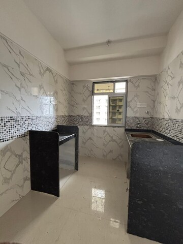 Kitchen in 1 BHK Apartment at DGS Sheetal Tapovan, Malad East – for Rent