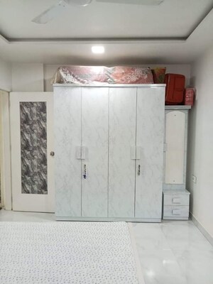 Bedroom in 1 BHK Apartment at Satellite Garden, Goregaon East – for Sale