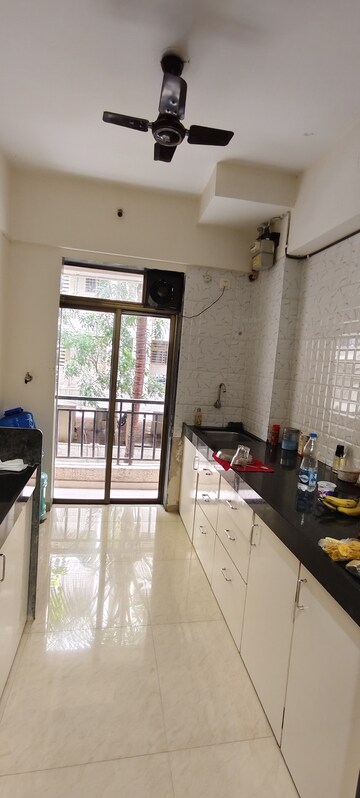 Kitchen in 1 BHK Apartment at K M Horizon Palms 2, Owale – for Rent