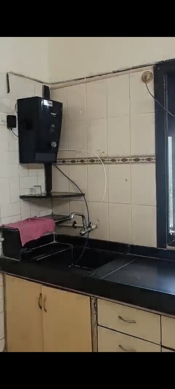 Kitchen in 2 BHK Apartment at Blue Star Apartment, Andheri West – for Rent