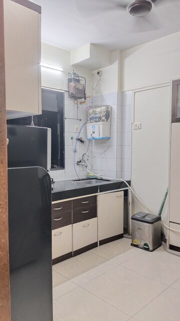 Kitchen in 1 BHK Apartment at OM Elegance, Malad West – for Rent