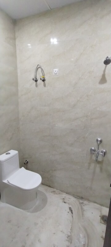 Bathroom in 2 BHK Builder Floor at Dharam Flats, Palam Vihar Extension – for Rent