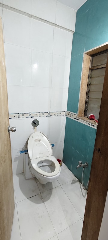 Bathroom in 1 BHK Apartment at Harmony Residency Owale, Owale – for Rent