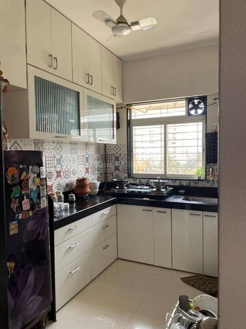 Kitchen in 2 BHK Apartment at Agarwal Vrindavan Gardens, Nalasopara East – for Sale