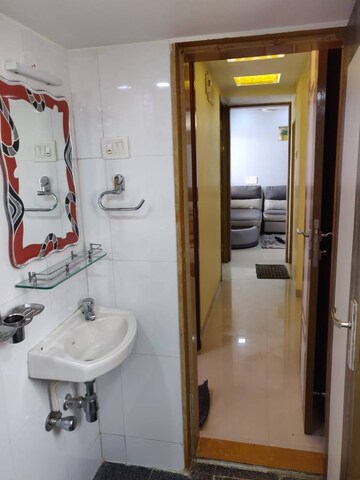 Bathroom in 2 BHK Apartment at Puranik Hometown, Ghodbunder Road – for Rent
