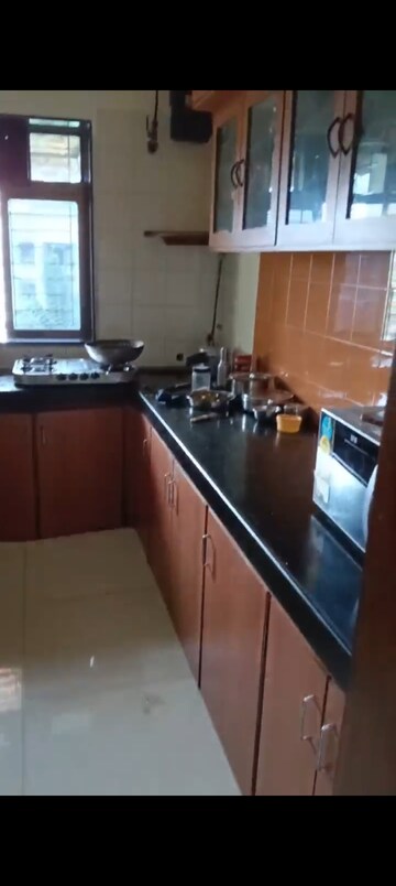 Kitchen in 2 BHK Apartment at Bindra Complex, Andheri East – for Rent