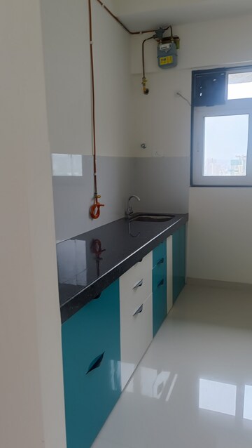 Kitchen in 2 BHK Apartment at Ashar Axis, Majiwada – for Rent