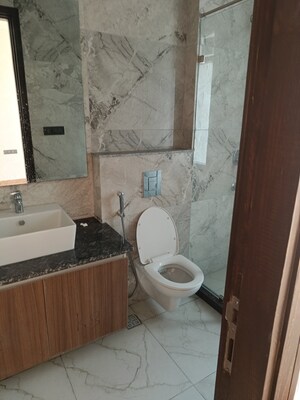 Bathroom in 3 BHK Builder Floor at Ansal API Esencia, Sector 67 – for Sale