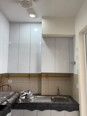 Kitchen in 3 BHK Apartment at Tata Eureka Park, Sector 150 – for Rent