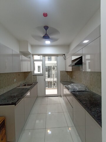 Kitchen in 4 BHK Apartment at Godrej Woods, Sector 43 – for Rent