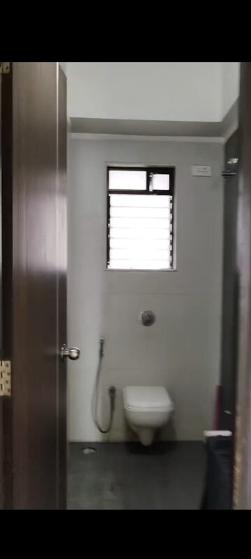 Bathroom in 2 BHK Apartment at Harmony Signature Towers, Owale – for Sale