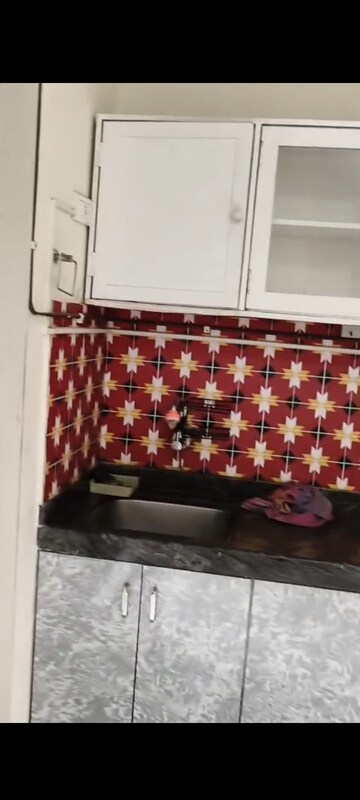 Kitchen in 2 BHK Apartment at Harmony Signature Towers, Owale – for Sale