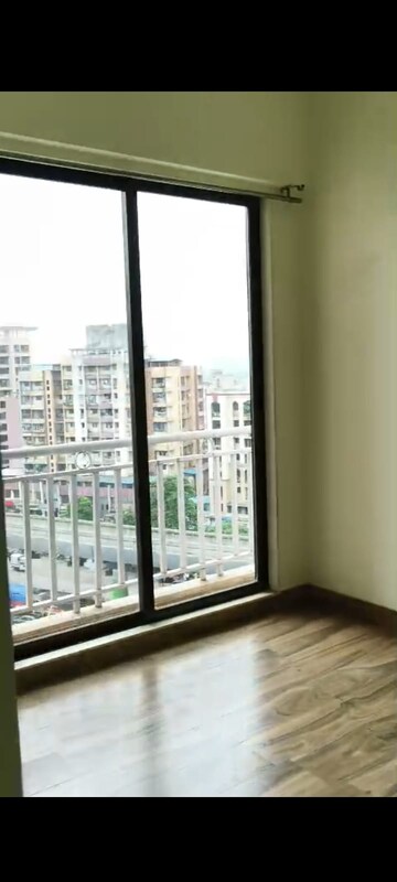 Room in 2 BHK Apartment at Harmony Signature Towers, Owale – for Sale