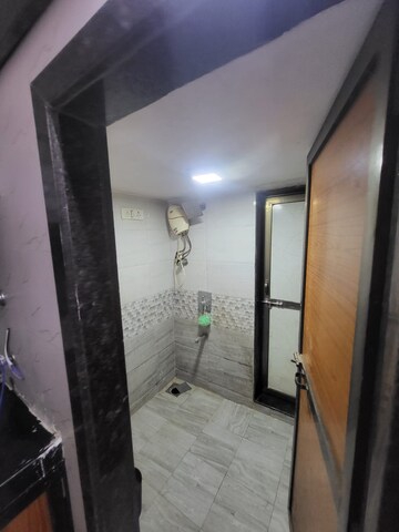 Bathroom in 1 BHK Apartment at Satellite Garden, Goregaon East – for Rent
