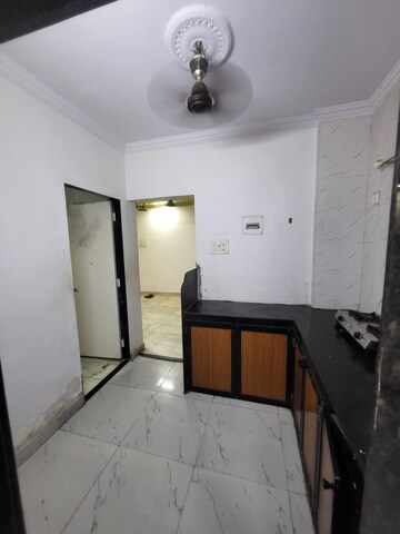 Kitchen in 1 BHK Apartment at Satellite Garden, Goregaon East – for Rent